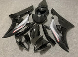 Black, Matte Black and Red Fairing Kit for a 2006 & 2007 Yamaha YZF-R6 motorcycle