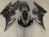 Black and Matte Black Fairing Kit for a 2005 Yamaha YZF-R6 motorcycle