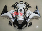 White, Black and Matte Black Fairing Kit for a 2006 & 2007 Honda CBR1000RR motorcycle.