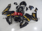 Black and Yellow REPSOL Fairing Kit for a 2003, 2004 Honda CBR600RR motorcycle
