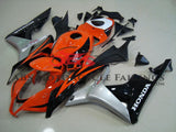 Orange, Black, Silver and White Fairing Kit for a 2007 and 2008 Honda CBR600RR motorcycle
