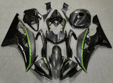 Faux Carbon Fiber, Black and Green Fairing Kit for a 2008, 2009, 2010, 2011, 2012, 2013, 2014, 2015 & 2016 Yamaha YZF-R6 motorcycle
