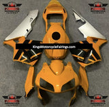 Dark Yellow, Black and Silver Fairing Kit for a 2003 and 2004 Honda CBR600RR motorcycle