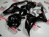 Black, Gray and Red Fairing Kit for a 2006 & 2007 Honda CBR1000RR motorcycle.