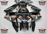 Matte Black and Orange Repsol Fairing Kit for a 2003 and 2004 Honda CBR600RR motorcycle