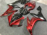 Red, Faux Carbon Fiber and Matte Black Fairing Kit for a 2004, 2005 & 2006 Yamaha YZF-R1 motorcycle