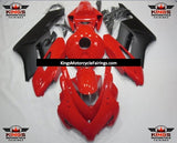 Red and Matte Black Fairing Kit for a 2004 and 2005 Honda CBR1000RR motorcycle