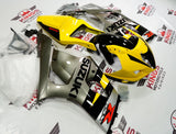 Yellow, Black and Gray Fairing Kit for a 2003 & 2004 Suzuki GSX-R1000 motorcycle