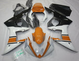 White, Orange and Matte Black Fairing Kit for a 2003 & 2004 Yamaha YZF-R6 motorcycle