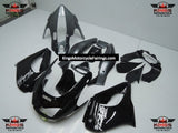 Black, Silver and White Fairing Kit for a 1996, 1997, 1998, 1999, 2000, 2001, 2002, 2003, 2004, 2005, 2006 & 2007 Yamaha YZF1000R motorcycle