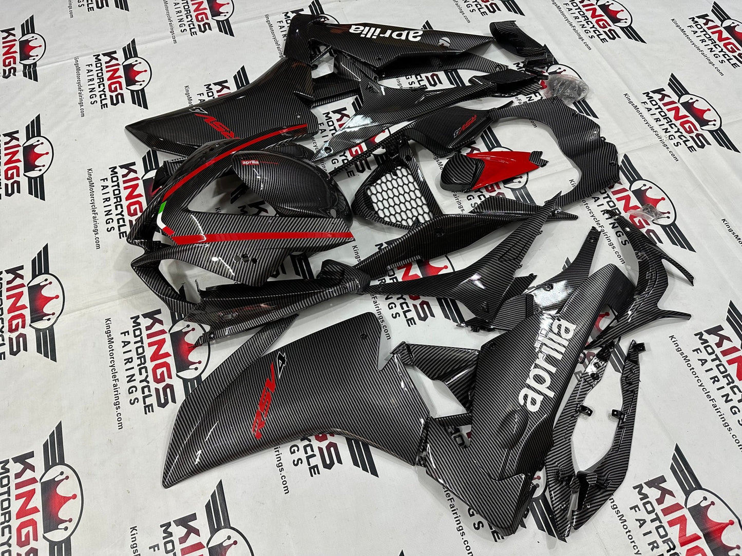 Aprilia RSV4 1000 Fairing Kit (2009-2015) Faux Carbon Fiber, Red, White at KingsMotorcycleFairings.com
