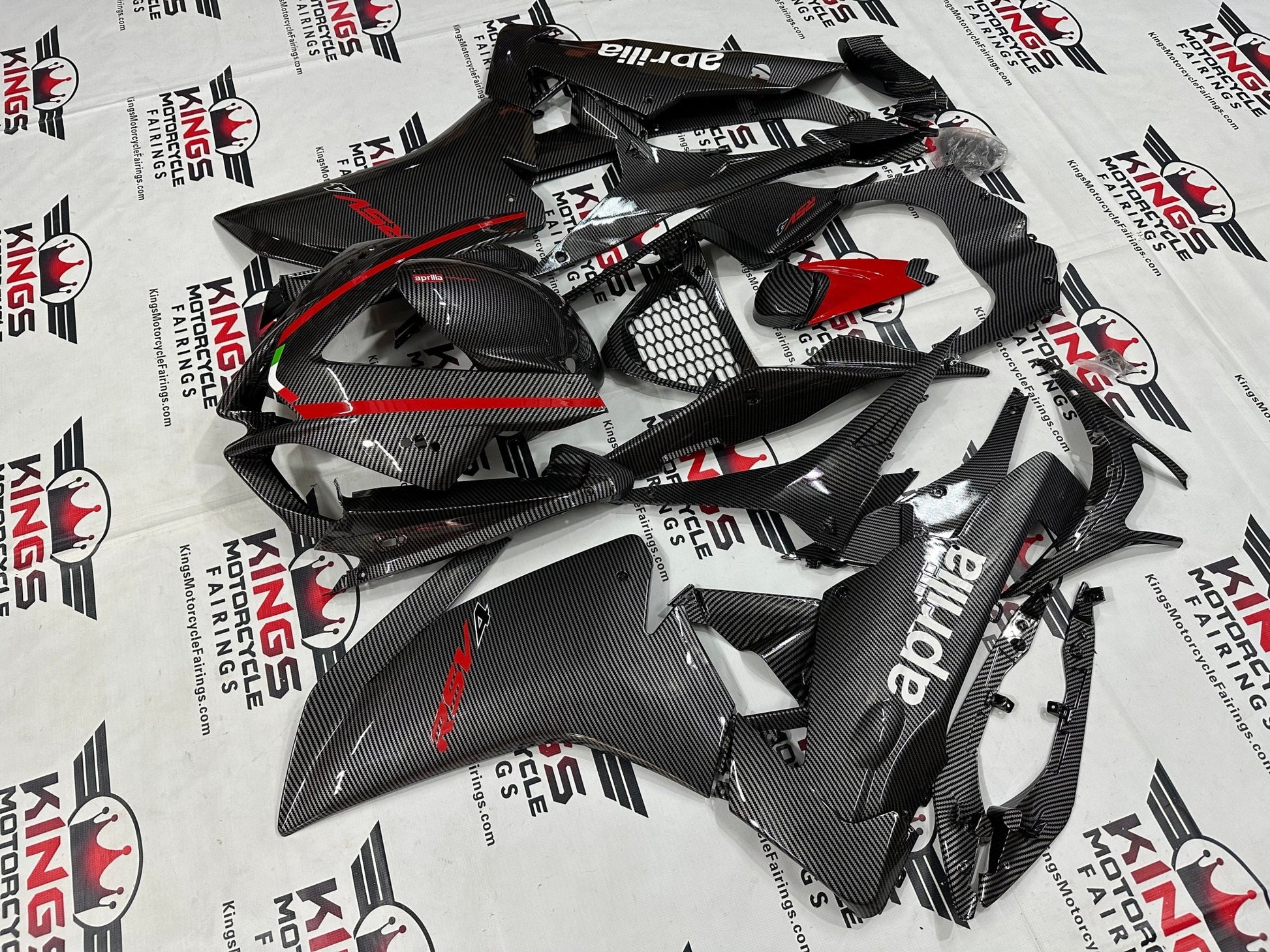Aprilia RSV4 1000 Fairing Kit (2009-2015) Faux Carbon Fiber, Red, White at KingsMotorcycleFairings.com