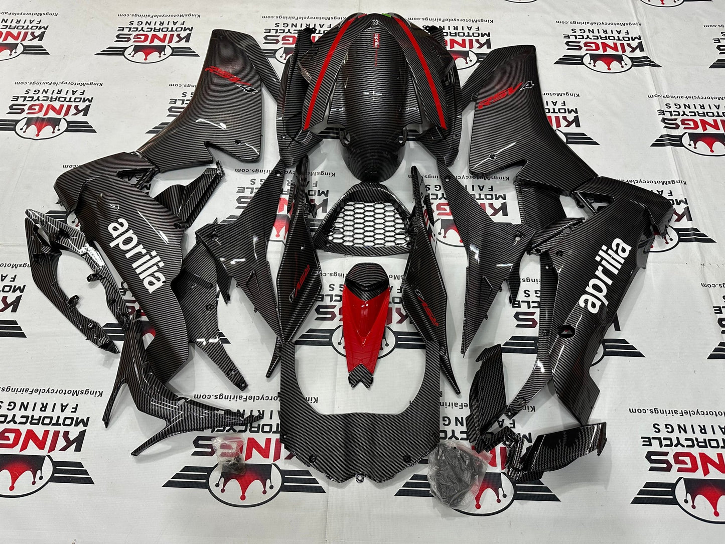 Aprilia RSV4 1000 Fairing Set (2009-2015) Faux Carbon Fiber, Red, White at KingsMotorcycleFairings.com