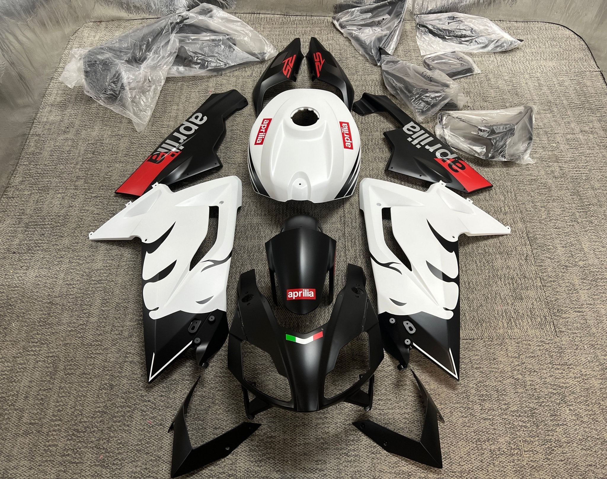 Aprilia RSV4 1100 Fairings (2021-2024) Matte Black, White Lion at KingsMotorcycleFairings.com