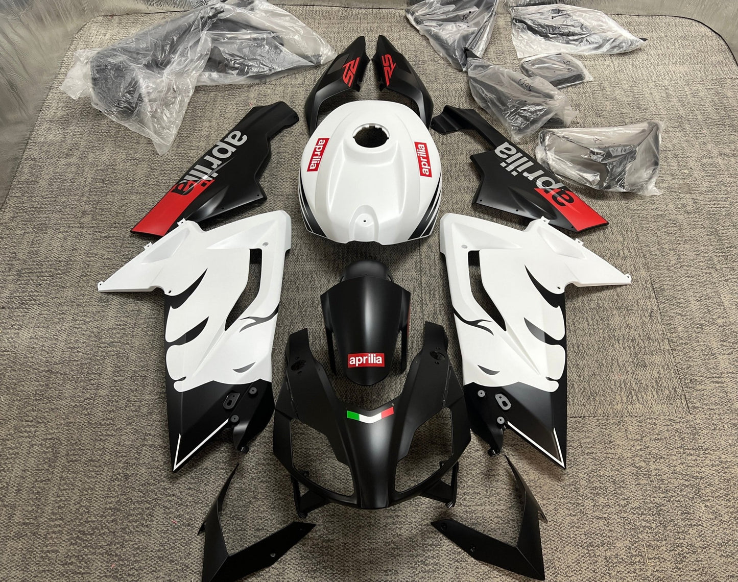 Aprilia RSV4 1100 Fairing Kit (2021-2024) Matte Black, White Lion at KingsMotorcycleFairings.com