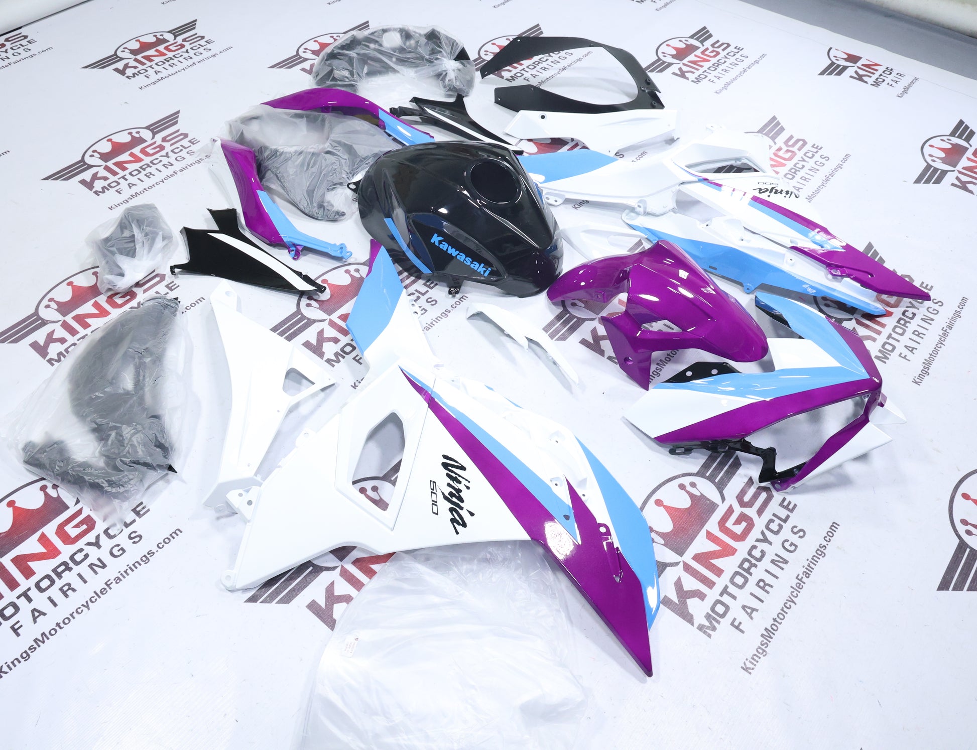 Fairings for Kawasaki Ninja 500 (2024-2025) White, Purple, Blue, Black at KingsMotorcycleFairings.com