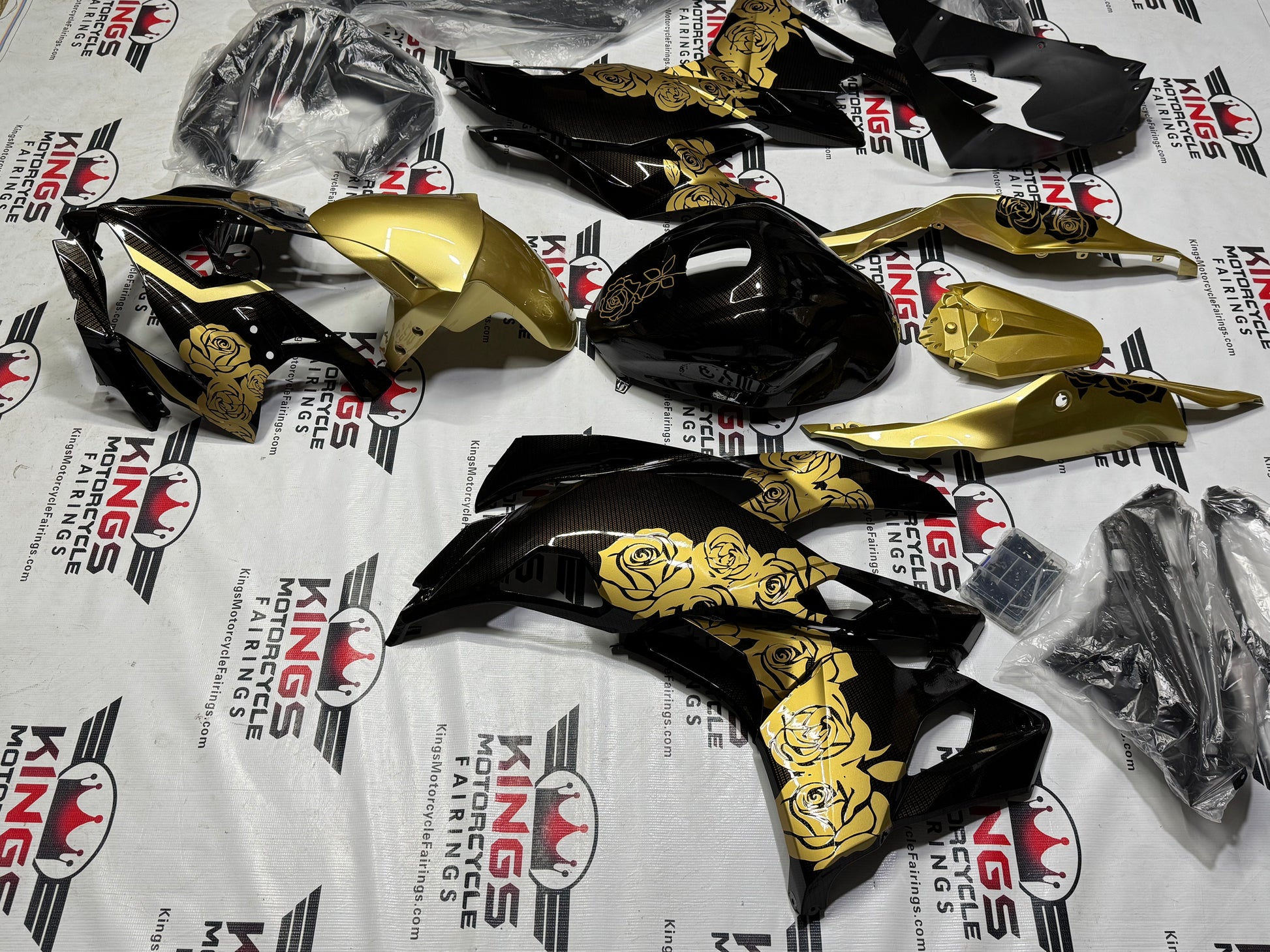 Fairings for Kawasaki ZX4RR (2019-2025) Faux Carbon Fiber, Gold Roses from KingsMotorcycleFairings.com