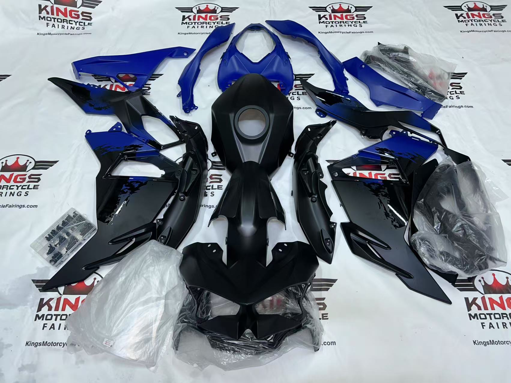 Fairings for Kawasaki Ninja 500 (2024-2025) Matte Black, Blue Splash from KingsMotorcycleFairings.com