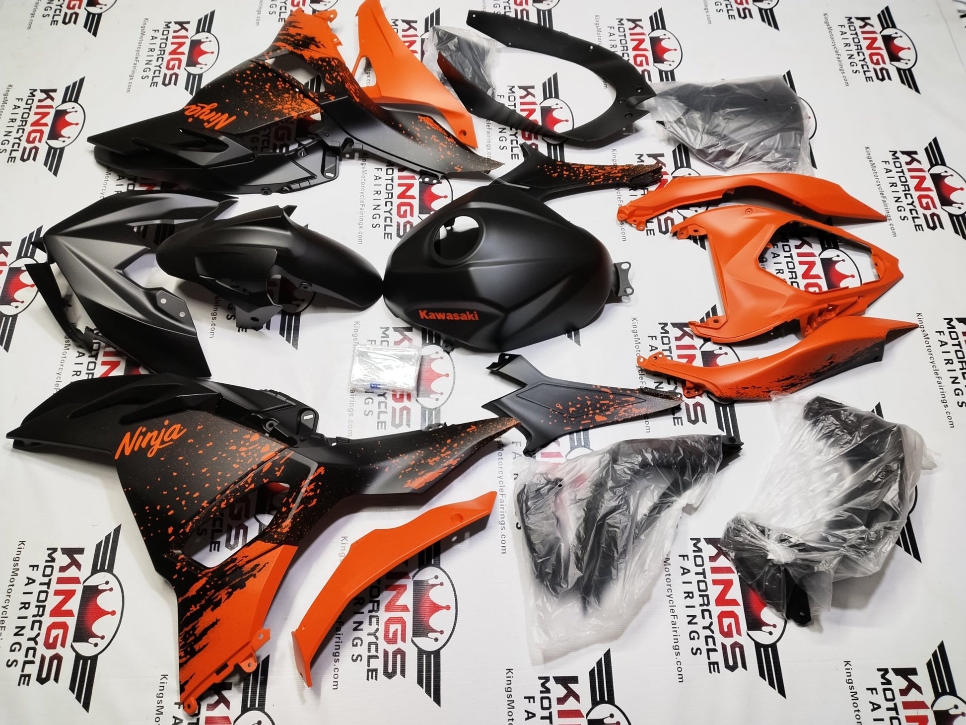 Fairings for Kawasaki Ninja 500 (2024-2025) Matte Black, Matte Orange Spray at KingsMotorcycleFairings.com