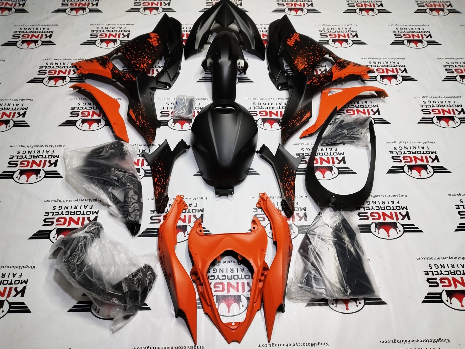 Fairings for Kawasaki Ninja 500 (2024-2025) Matte Black, Orange Spray from KingsMotorcycleFairings.com