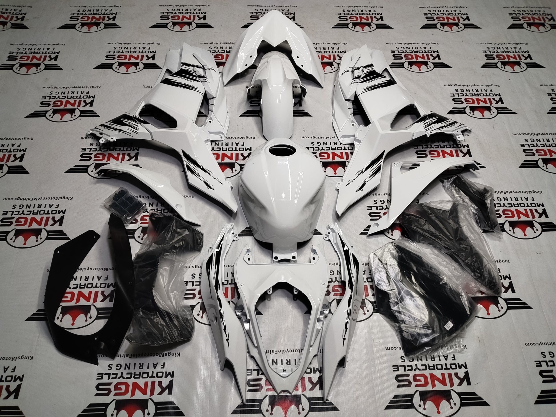 Fairings for Kawasaki Ninja 500 (2024-2025) White, Black Brush Strokes from KingsMotorcycleFairings.com