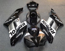 Honda CBR 1000RR Fairings (2004-2005) Black, Silver, White Repsol at KingsMotorcycleFairings.com