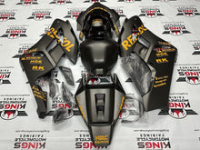 Honda CBR1000RR Fairings (2004-2005) Matte Black, Light Orange Repsol at KingsMotorcycleFairings.com