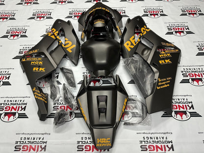 Honda CBR1000RR Fairings (2004-2005) Matte Black, Light Orange Repsol at KingsMotorcycleFairings.com