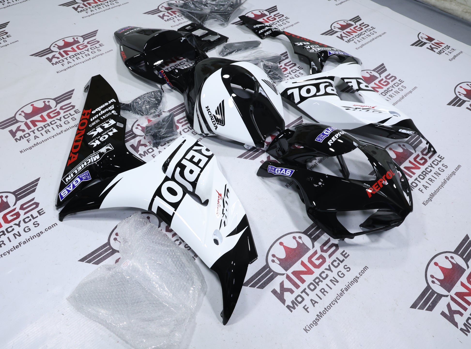 Honda CBR1000RR Fairings (2006-2007) Black, White Repsol from KingsMotorcycleFairings.com
