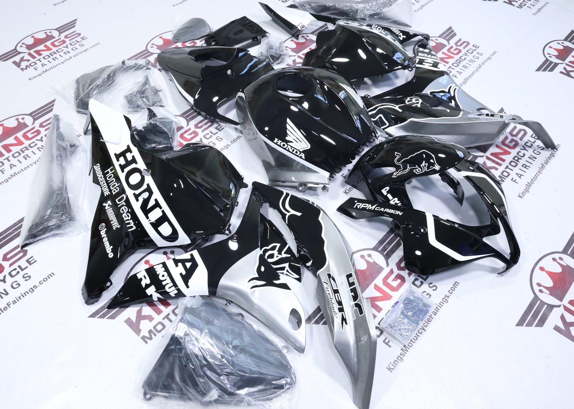 Honda CBR600RR Fairings (2009-2012) Black, Silver, White Bull from KingsMotorcycleFairings.com