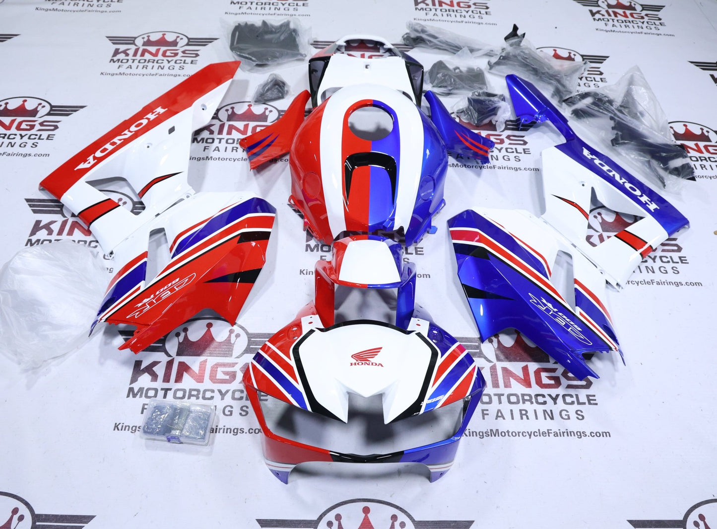 Honda CBR600RR Fairings (2024-2025) White, Blue, Red, Stripe at KingsMotorcycleFairings.com