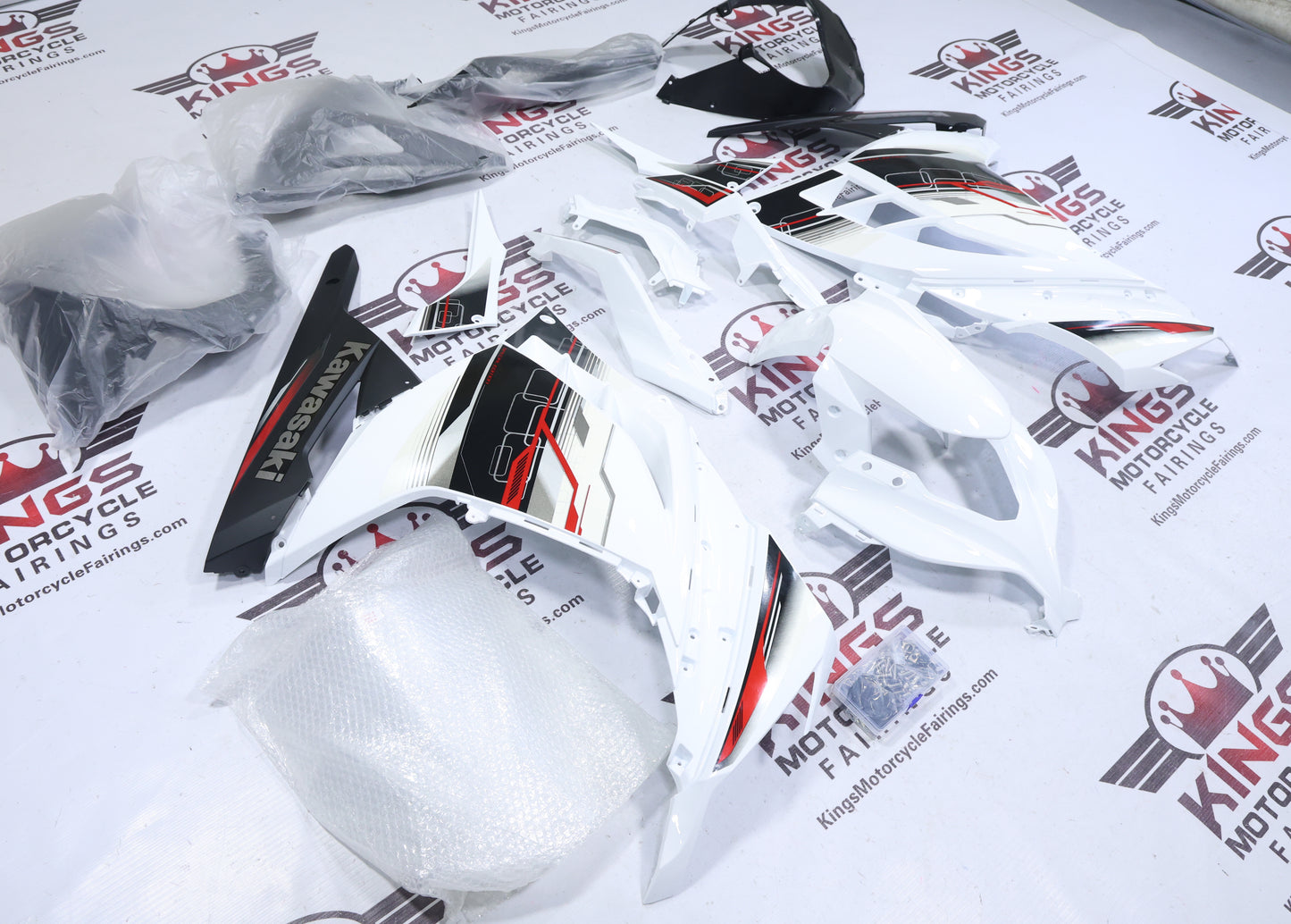 Kawasaki Ninja 300 Fairings (2013-2024) White, Black, Red Stripes from KingsMotorcycleFairings.com