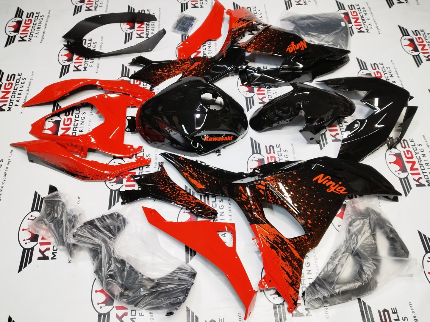 Kawasaki Ninja 500 Fairing Kit (2024-2025) Black, Red Spray at KingsMotorcycleFairings.com