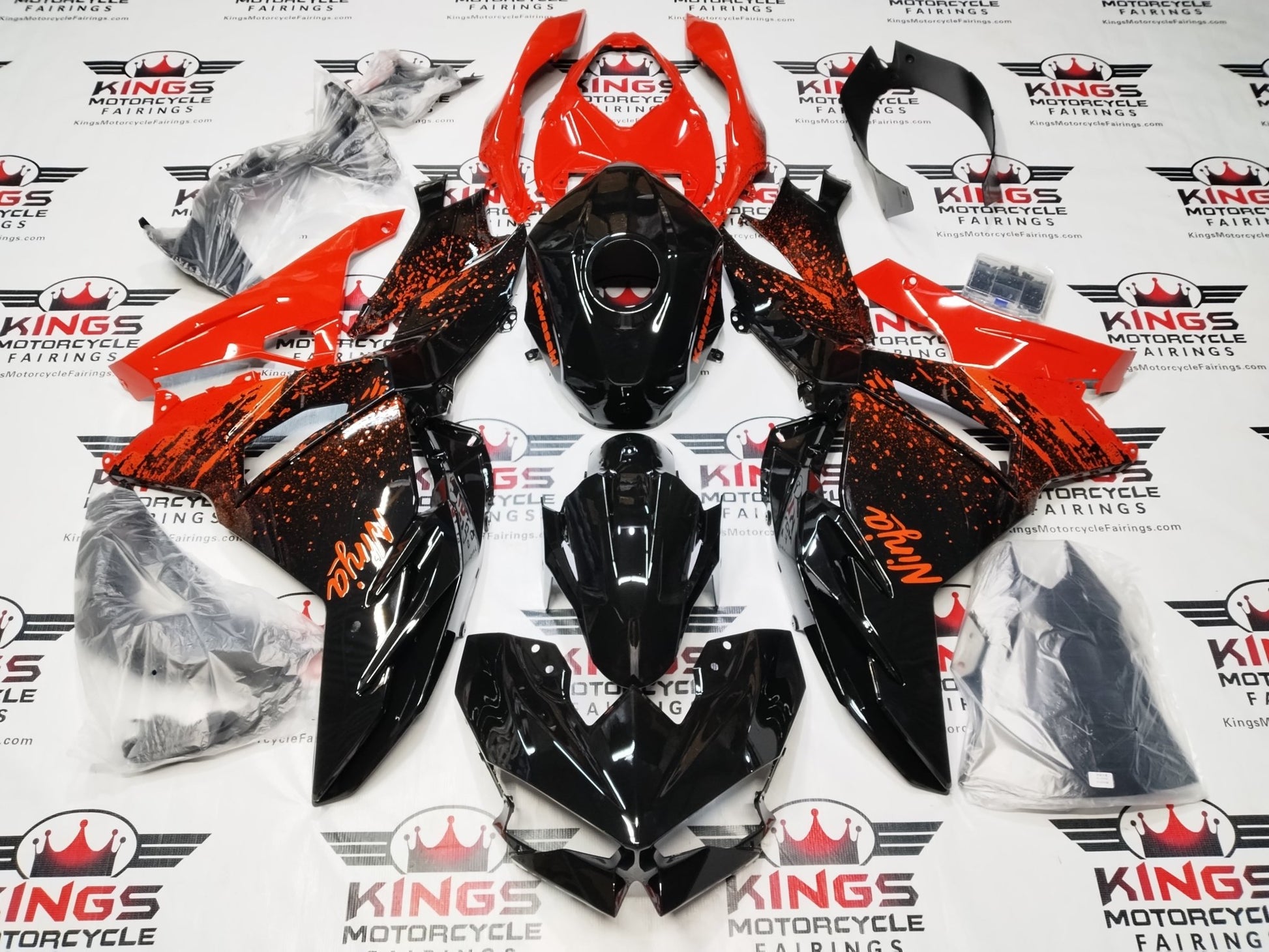 Kawasaki Ninja 500 Fairing Set (2024-2025) Black, Red Spray at KingsMotorcycleFairings.com