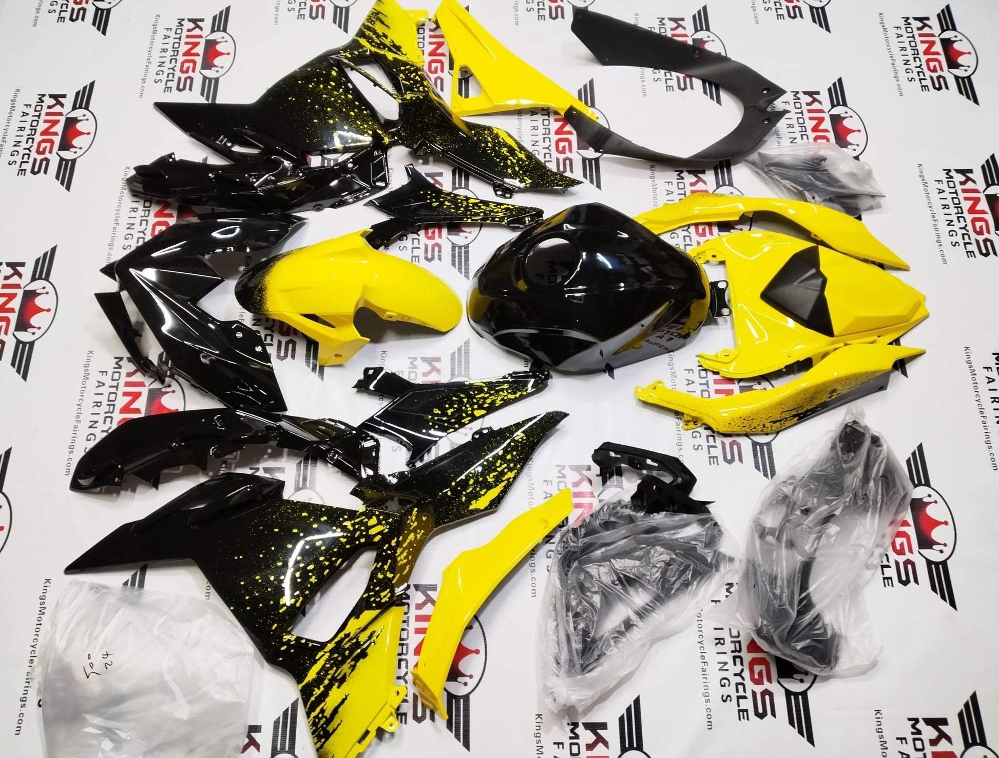 Kawasaki Ninja 500 Fairing Set (2024-2025) Black, Yellow Spray at KingsMotorcycleFairings.com
