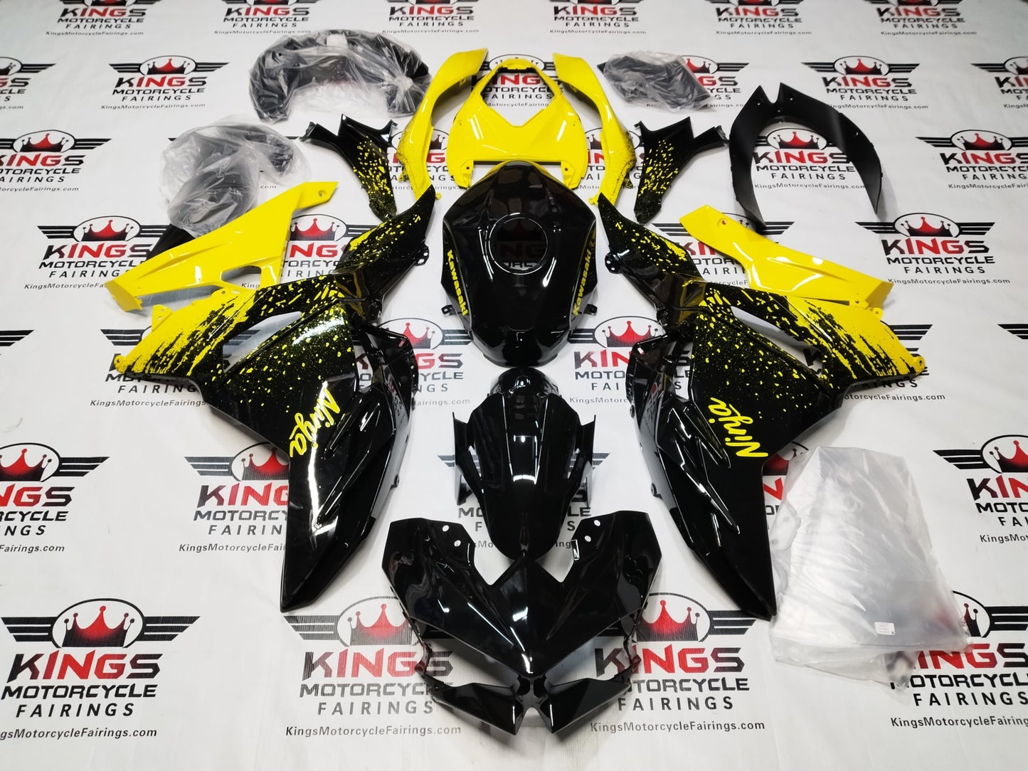 Kawasaki Ninja 500 Fairing Set (2024-2025) Black, Yellow Spray at KingsMotorcycleFairings.com