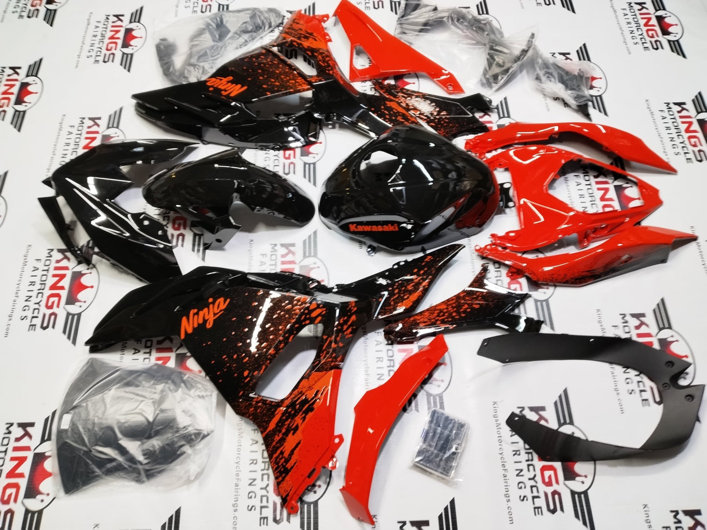 Kawasaki Ninja 500 Fairings (2024-2025) Black, Red Spray at KingsMotorcycleFairings.com