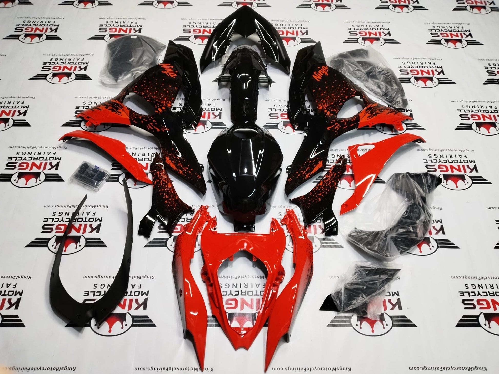 Kawasaki Ninja 500 Fairings (2024-2025) Black, Red Spray from KingsMotorcycleFairings.com