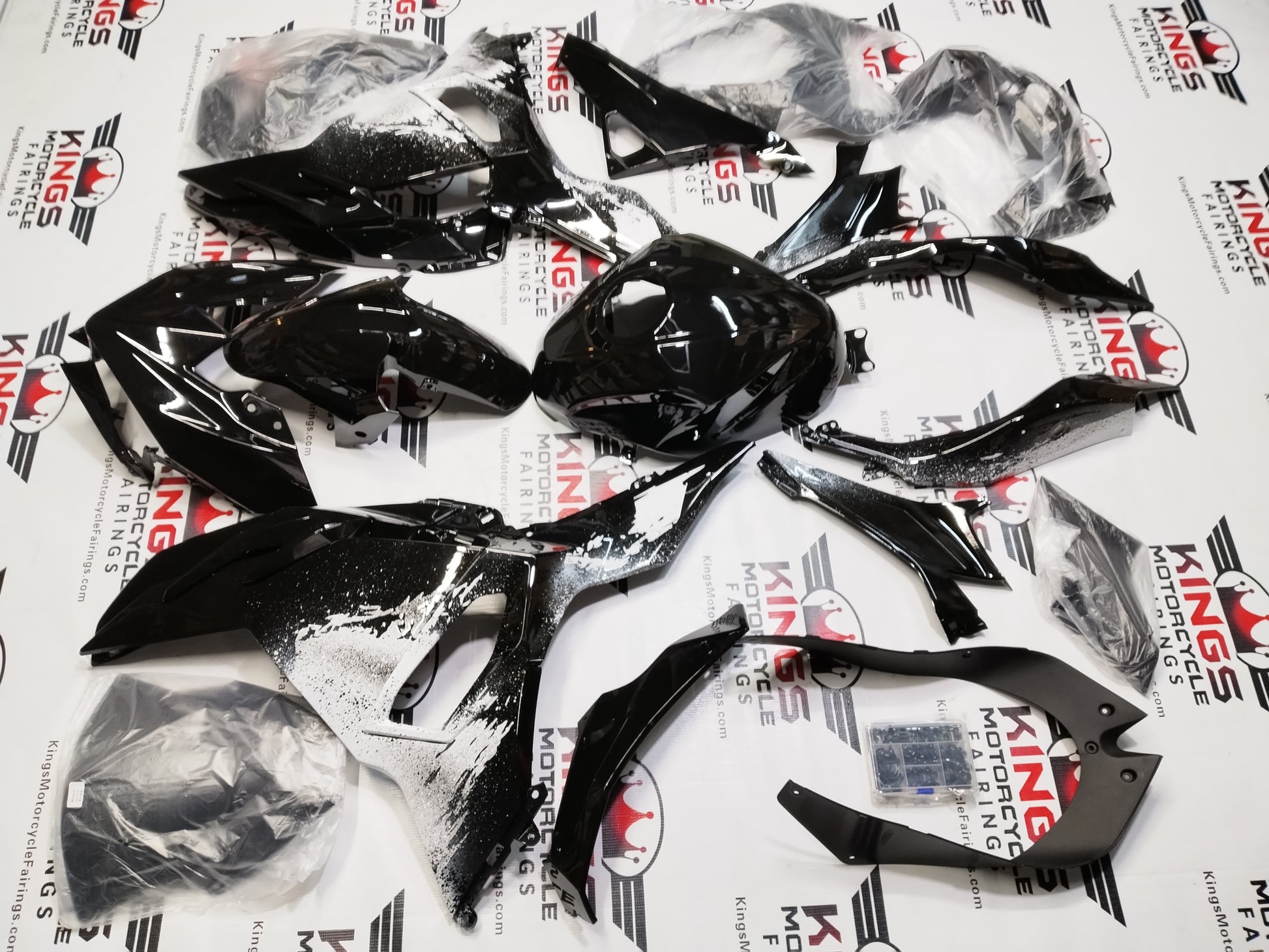 Kawasaki Ninja 500 Fairings (2024-2025) Black, White Spray at KingsMotorcycleFairings.com