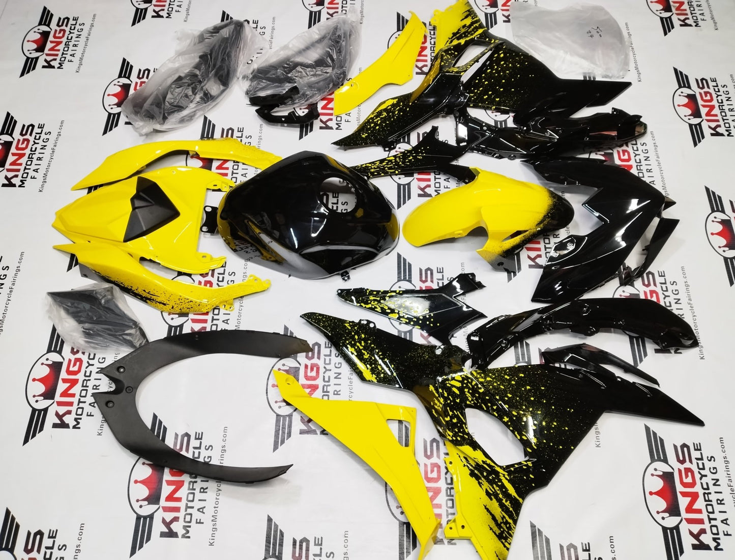 Kawasaki Ninja 500 Fairings (2024-2025) Black, Yellow Spray from KingsMotorcycleFairings.com