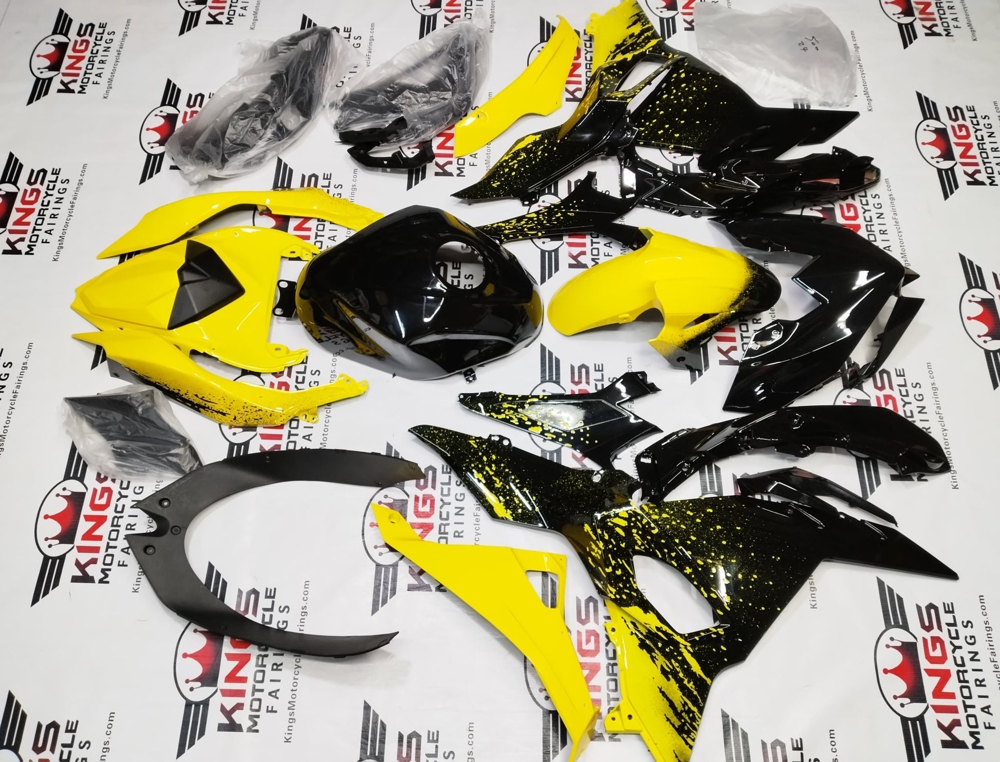 Kawasaki Ninja 500 Fairings (2024-2025) Black, Yellow Spray from KingsMotorcycleFairings.com