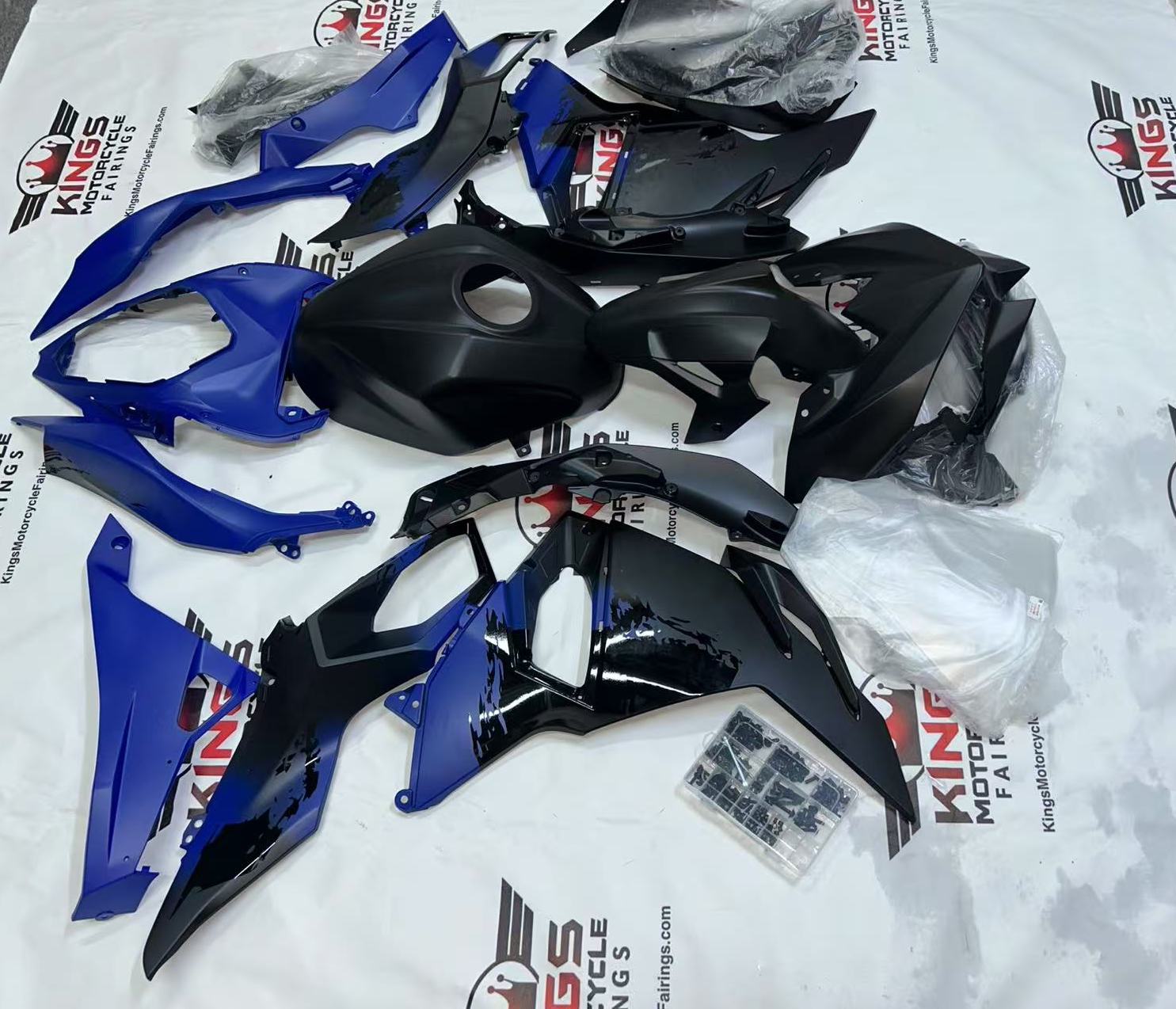 Kawasaki Ninja 500 Fairings (2024-2025) Matte Black, Blue Splash from KingsMotorcycleFairings.com