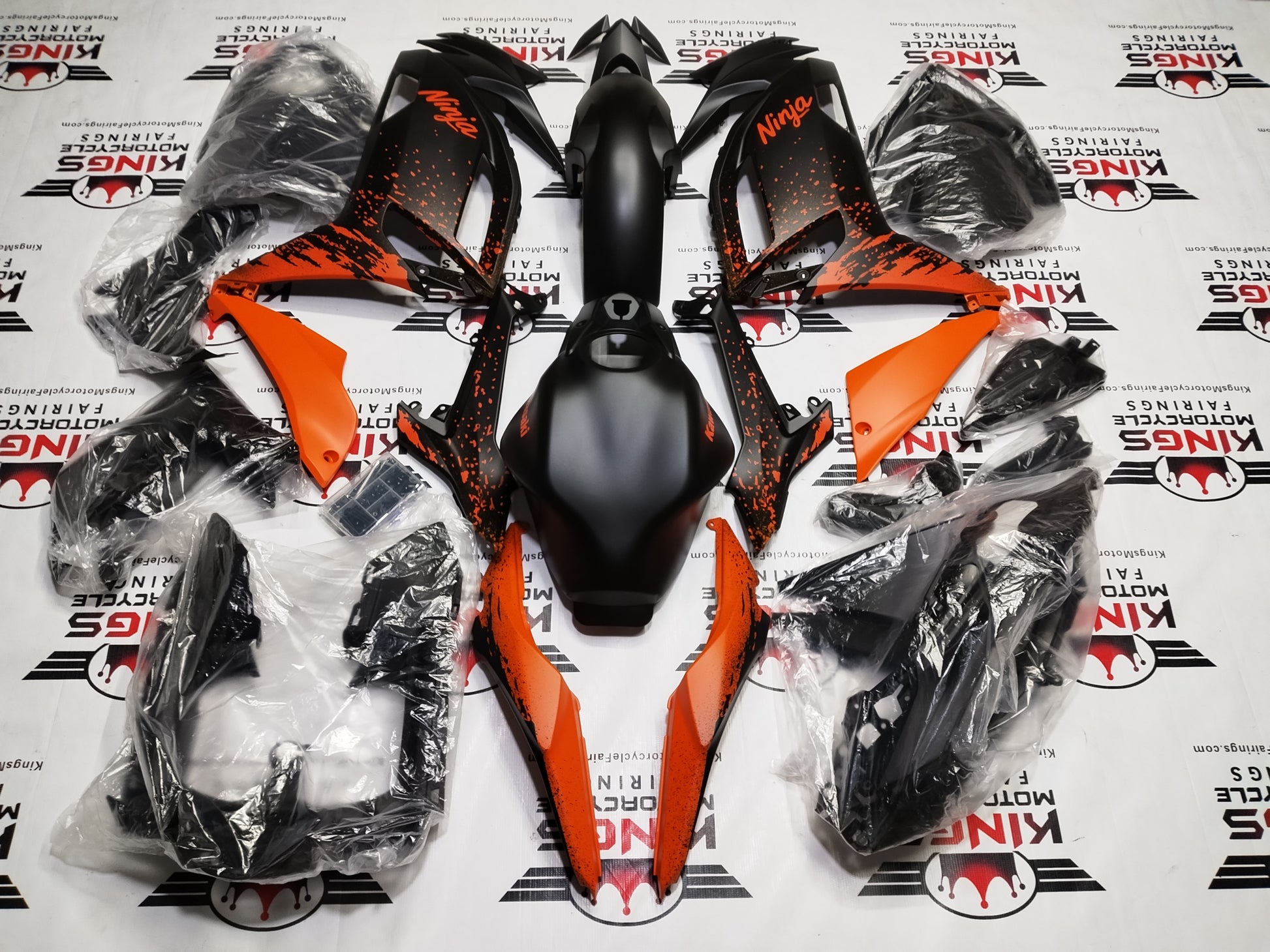 Kawasaki Ninja 500 Fairings (2024-2025) Matte Black, Matte Orange Splash at KingsMotorcycleFairings.com