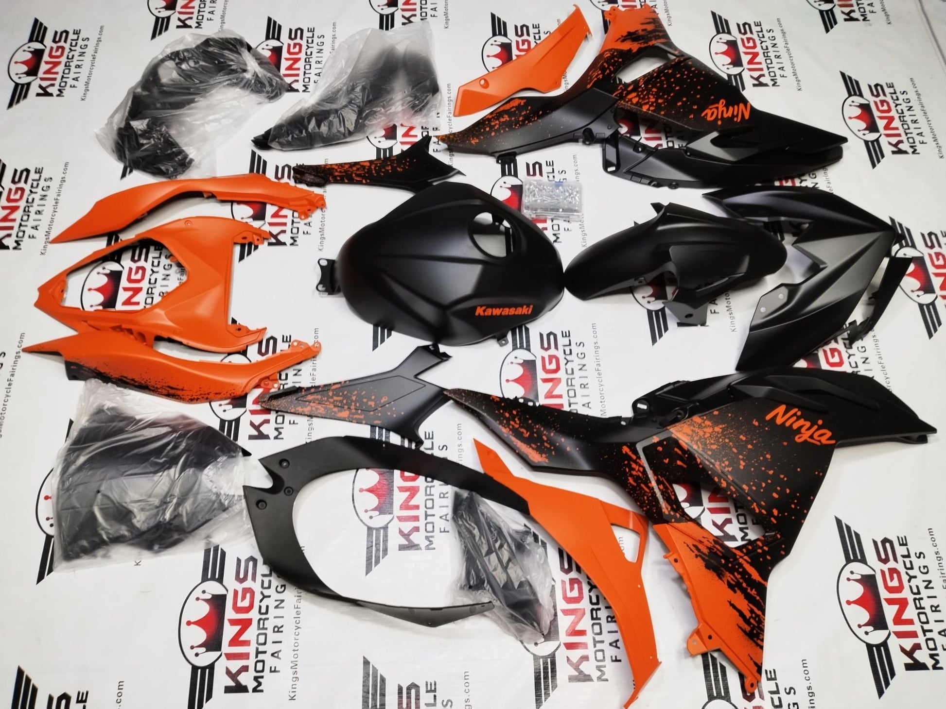 Kawasaki Ninja 500 Fairings (2024-2025) Matte Black, Orange Spray at KingsMotorcycleFairings.com