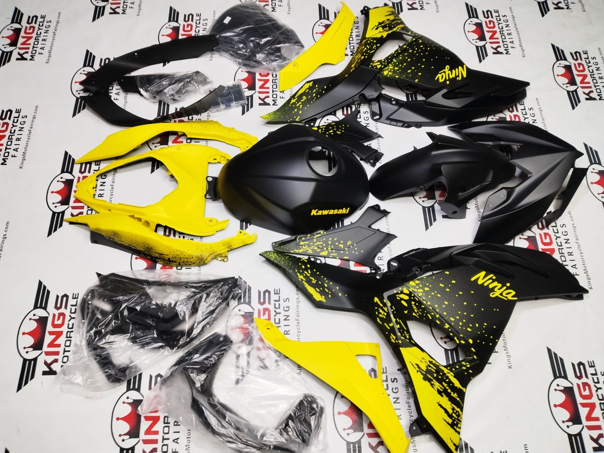 Kawasaki Ninja 500 Fairings (2024-2025) Matte Black, Yellow Spray from KingsMotorcycleFairings.com