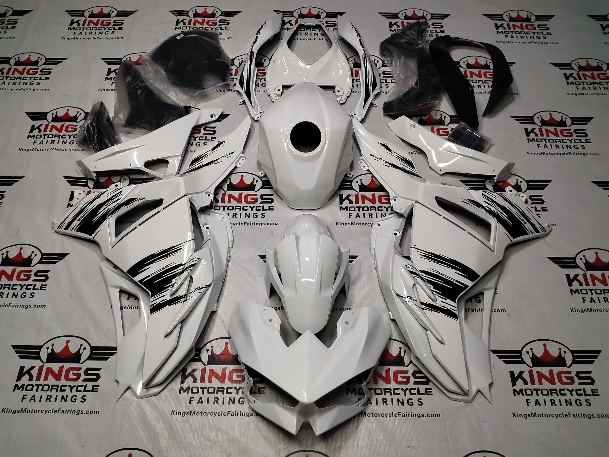 Kawasaki Ninja 500 Fairings (2024-2025) White, Black Brush Strokes from KingsMotorcycleFairings.com