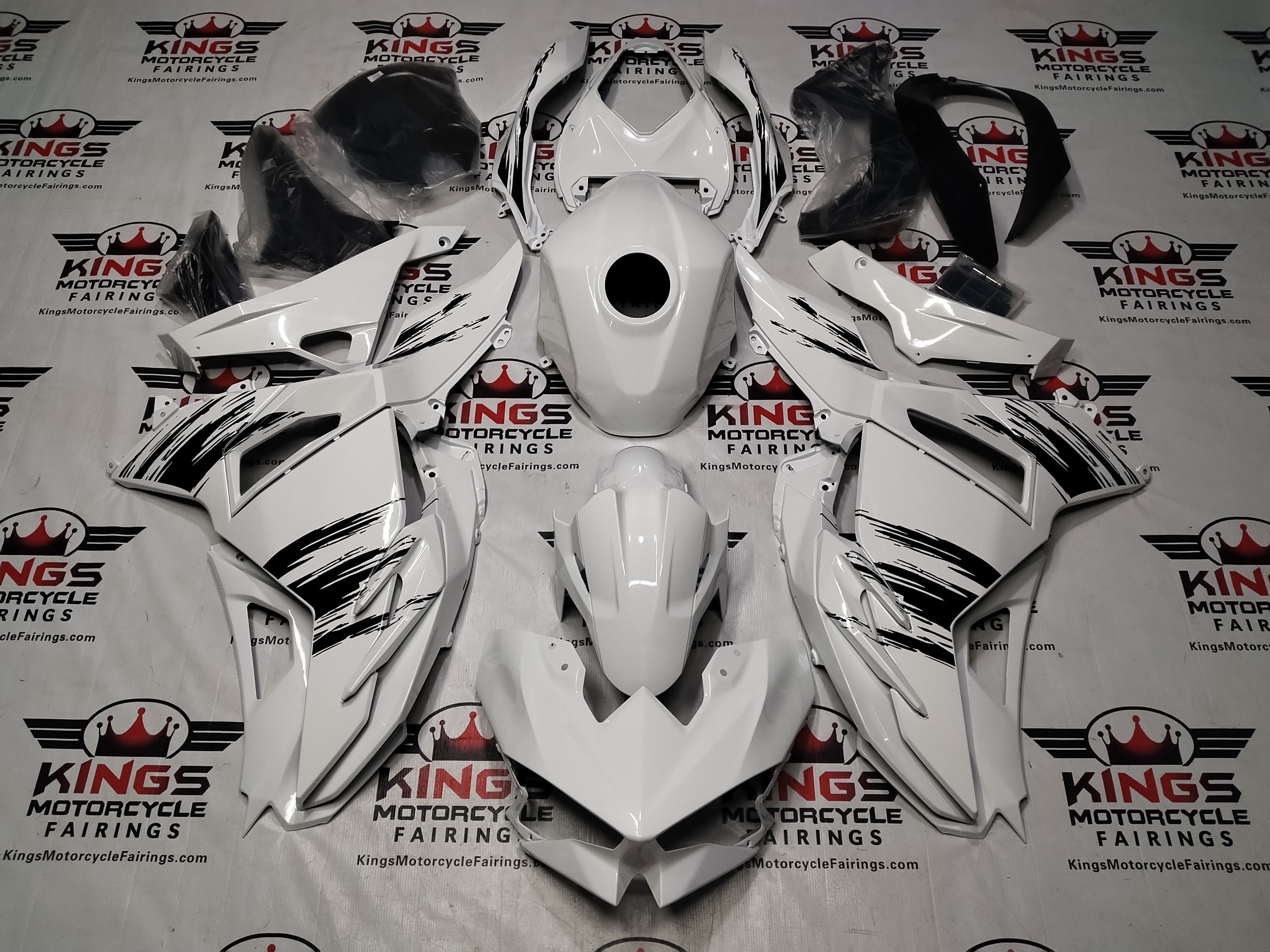 Kawasaki Ninja 500 Fairings (2024-2025) White, Black Brush Strokes from KingsMotorcycleFairings.com
