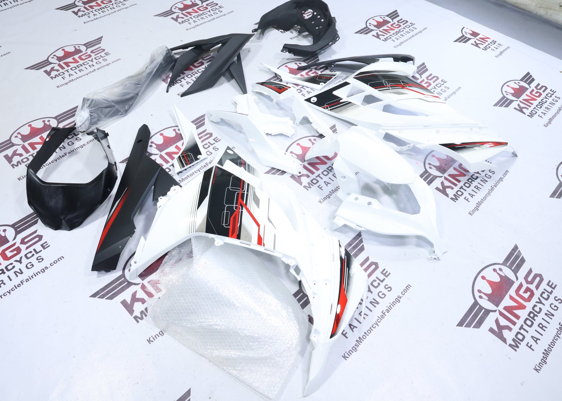 Kawasaki Ninja 300 Fairings (2013-2024) White, Black, Red, Gray from KingsMotorcycleFairings.com