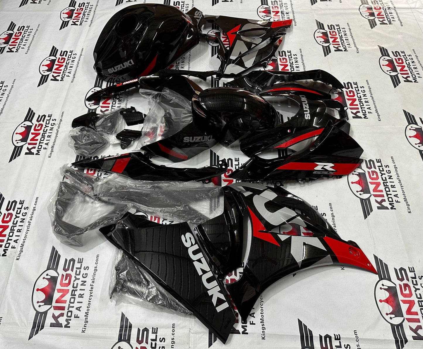 Suzuki GSX-R1000 Fairings (2017-2025) Black, Silver, Red Stripe at KingsMotorcycleFairings.com
