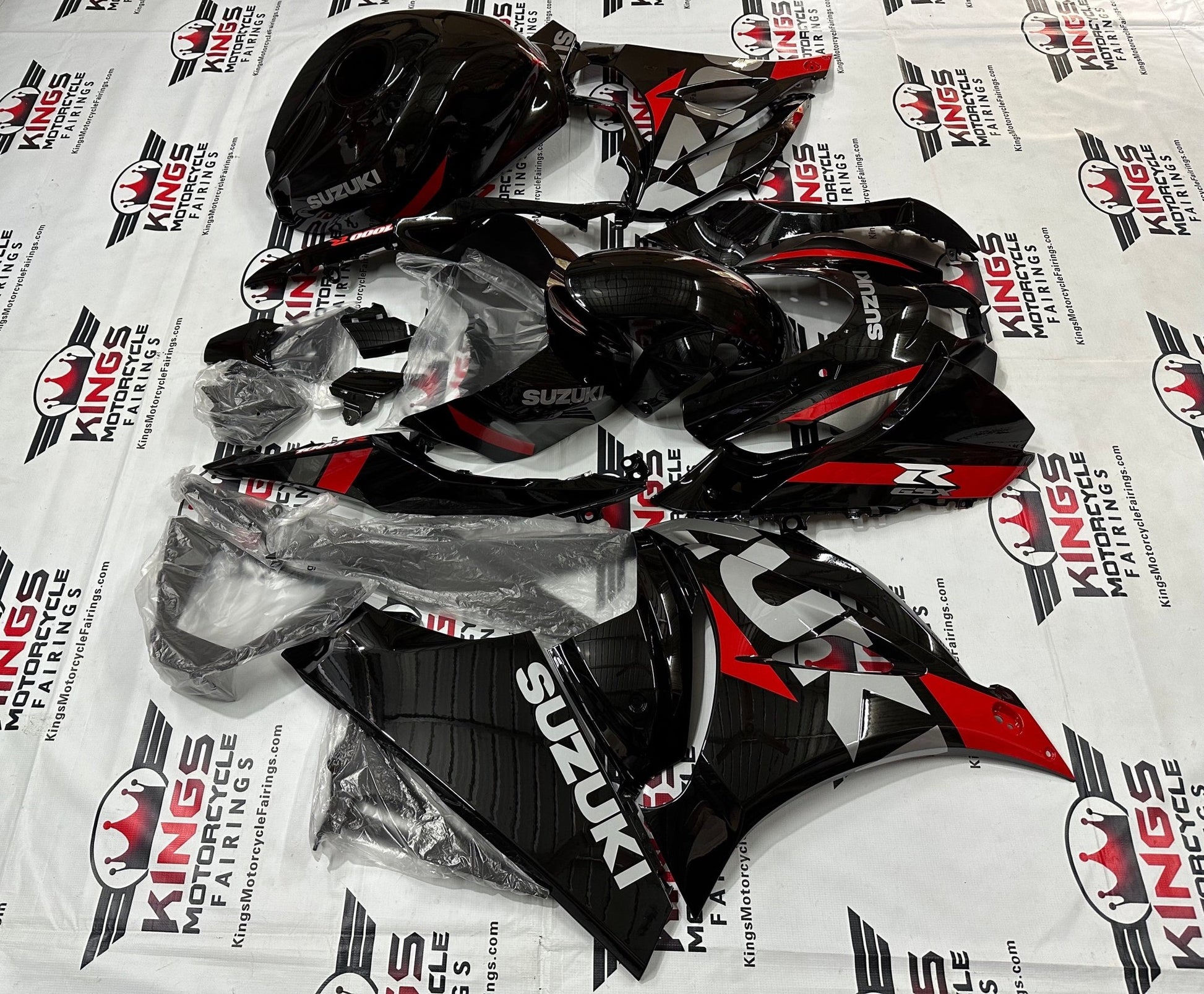 Suzuki GSX-R1000 Fairings (2017-2025) Black, Silver, Red Stripe at KingsMotorcycleFairings.com
